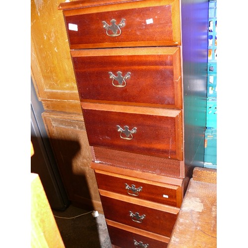 502 - 2 X 3 DRAWER BEDSIDE CHESTS WITH BRASS DROP LOOP HANDLES, IN MAHOGANY FINISH.