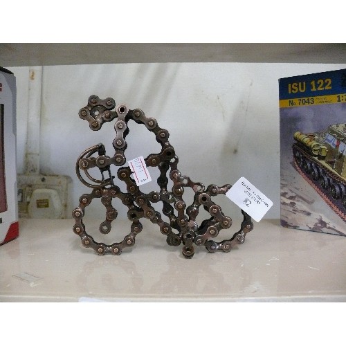 82 - A MODEL OF A CYCLIST MADE OUT OF A BIKE CHAIN