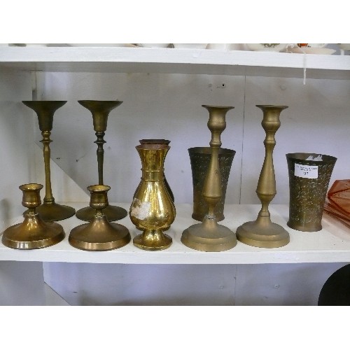 97 - THREE PAIRS OF DECORATIVE BRASS CANDLESTICKS PLUS TWO PAIRS OF DECORATIVE BRASS VASES.