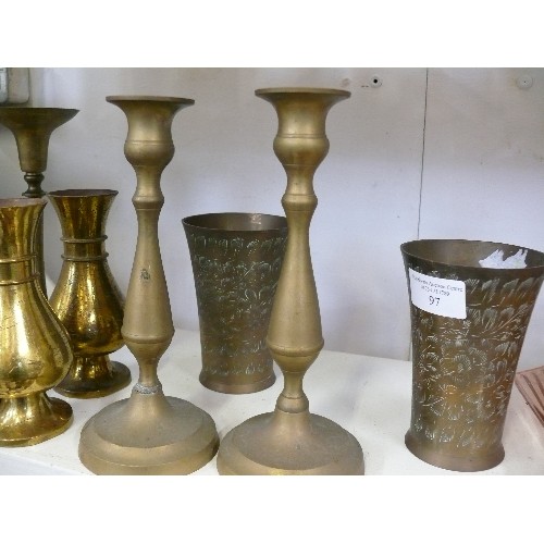 97 - THREE PAIRS OF DECORATIVE BRASS CANDLESTICKS PLUS TWO PAIRS OF DECORATIVE BRASS VASES.