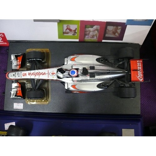 125 - A LIMITED EDITION MODEL OF MICHAEL SCHUMACHER SHANGHAI GRAND PRIX OF CHINA 2006 PLUS A MERCEDES BENZ... 