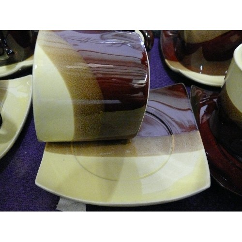 150 - SET OF SIX COFFEE CUPS AND SAUCERS PLUS GRANITE PLACEMATS AND A KITCHEN STAND.