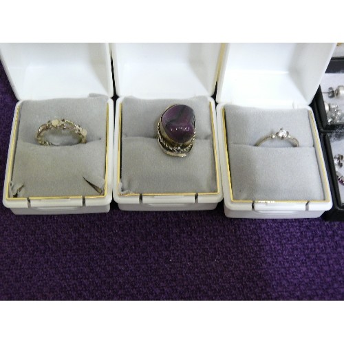 153 - A COLLECTION OF VARIOUS BOXED EARRINGS AND RINGS