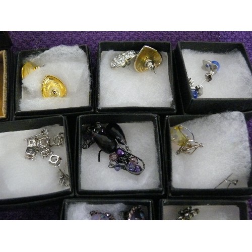 153 - A COLLECTION OF VARIOUS BOXED EARRINGS AND RINGS