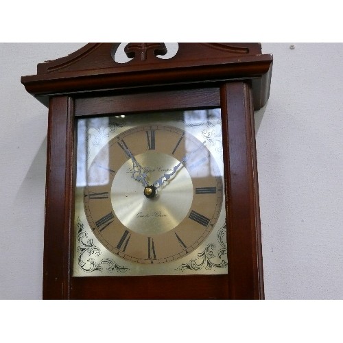 160 - A WOODEN CASED WALL CLOCK