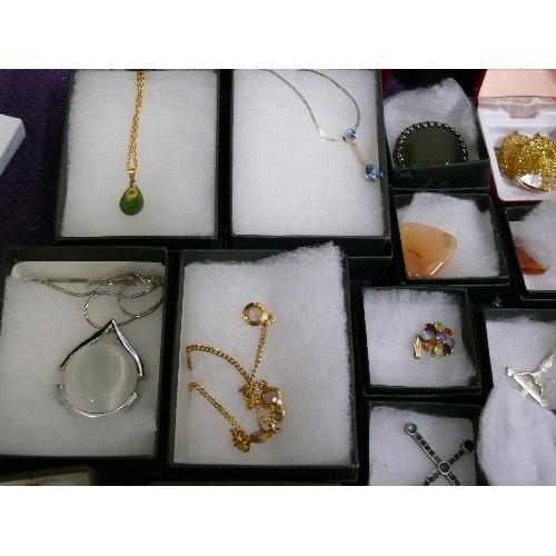 165 - A LARGE SELECTION OF MIXED COSTUME JEWELLERY, ALL BOXED, MOSTLY DECORATIVE PENDANTS AND CHAINS.