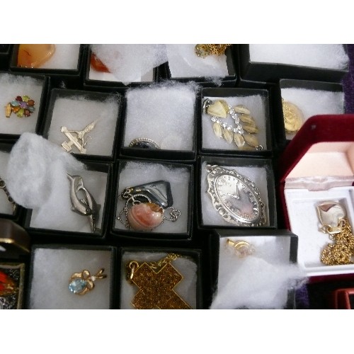 165 - A LARGE SELECTION OF MIXED COSTUME JEWELLERY, ALL BOXED, MOSTLY DECORATIVE PENDANTS AND CHAINS.