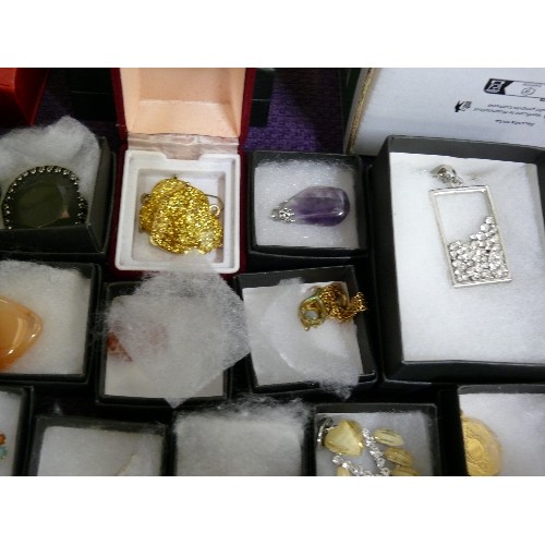 165 - A LARGE SELECTION OF MIXED COSTUME JEWELLERY, ALL BOXED, MOSTLY DECORATIVE PENDANTS AND CHAINS.