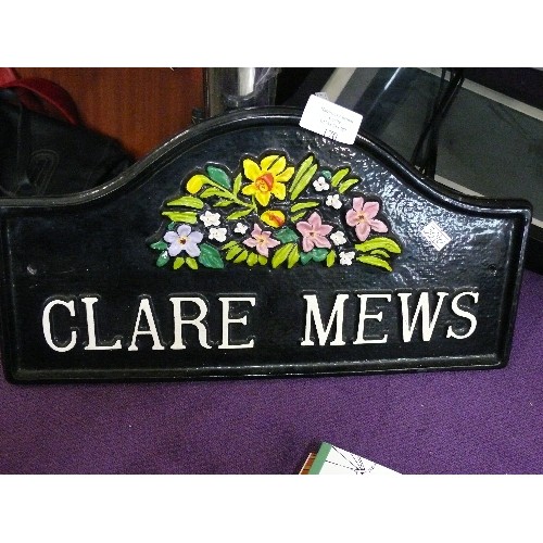 170 - A CAST METAL FLORAL HOUSE SIGN 'CLARE MEWS'