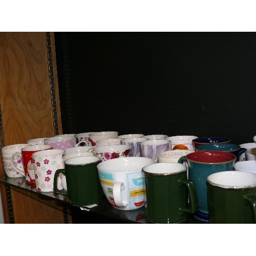 202 - A SHELF OF GOOD QUALITY MUGS IN VARIOUS DESIGNS TO INCLUDE DENBY