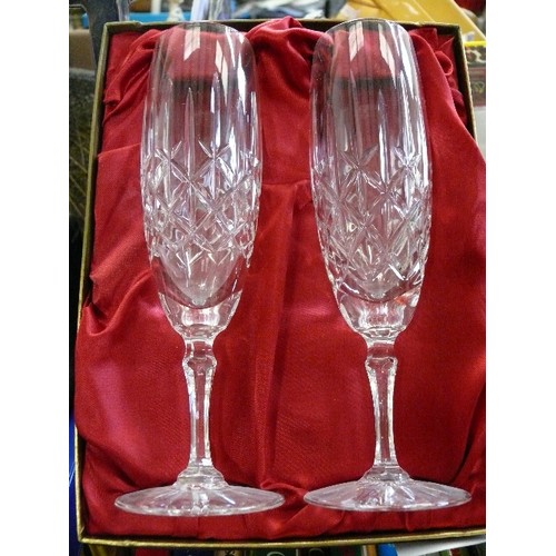 269 - A PAIR OF EDINBURGH CRYSTAL CHAMPAGNE FLUTES IN ORIGINAL BOX.