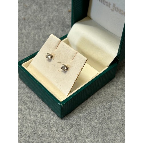 20 - A PAIR OF 18CT GOLD AND DIAMOND STUD EARRINGS BOXED WEIGHT .8GR