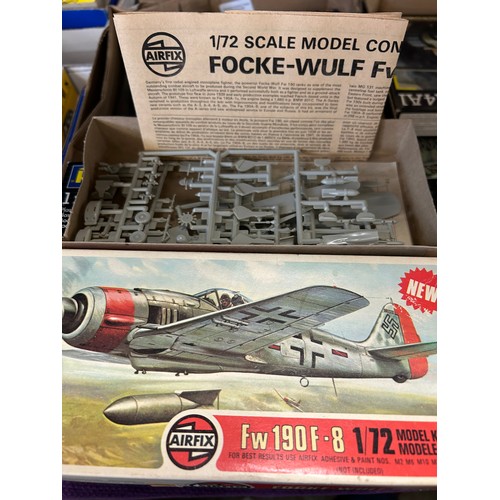 217 - A BOX CONTAINING FOUR REVELL MODEL KITS OF TANKS PLUS AN AIRFIX MODEL KIT OF A FW 190 F-8 AEROPLANE.