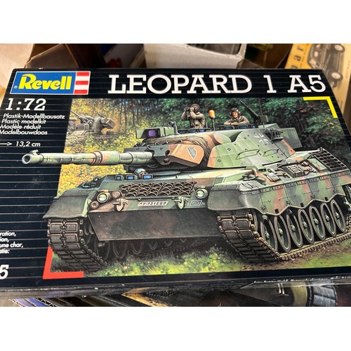 217 - A BOX CONTAINING FOUR REVELL MODEL KITS OF TANKS PLUS AN AIRFIX MODEL KIT OF A FW 190 F-8 AEROPLANE.