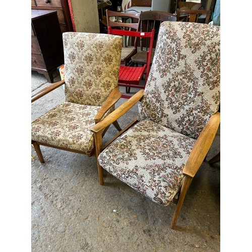 513C - TWO MID CENTURY PARKER KNOLL ARMCHAIRS