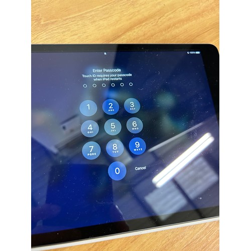 45 - APPLE IPAD - WORKING (TURNS ON & ASKS FOR CODE)