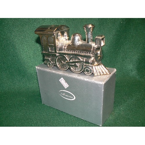 88 - A DECORATIVE BOXED SILVER PLATE TRAIN MONEY BOX