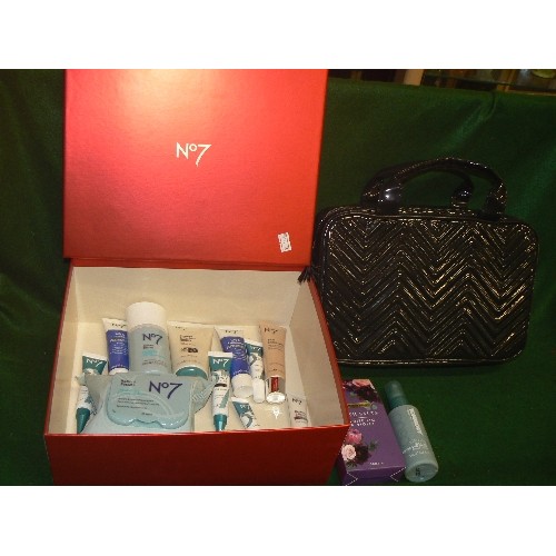 114 - A BOOTS NO.7 GIFT BOX WITH CONTENTS OF NO. 7 TOILETRIES AND A NO.7 HANDBAG/WASHBAG.