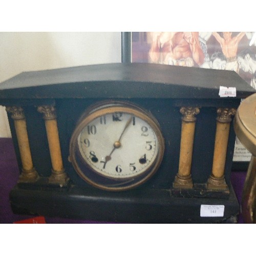 141 - A LARGE WOODEN MANTLE CLOCK