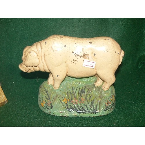 281 - TWO DECORATIVE CAST IRON PIG DOORSTOPS