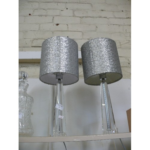 87 - A PAIR OF LOVELY TABLE LAMPS WITH FACETED GLASS BASES AND SILVER SEQUIN SHADES