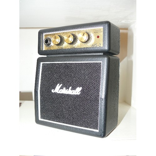 97 - A MINIATURE GUITAR AMPLIFIER BY MARSHALL MS-2 WITH HOOK TO ATTACH TO BELT