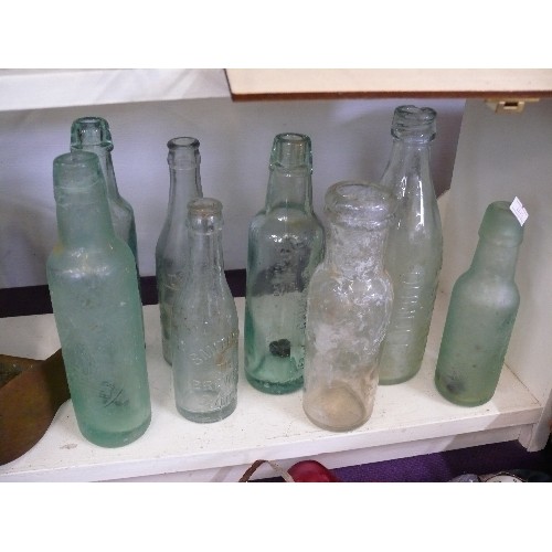 102 - A CAST IRON SHOE LAST, ENAMEL JAM PAN AND A COLLECTION OF VINTAGE GLASS BOTTLES MAINLY FROM OUNDLE A... 