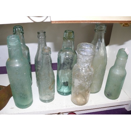 102 - A CAST IRON SHOE LAST, ENAMEL JAM PAN AND A COLLECTION OF VINTAGE GLASS BOTTLES MAINLY FROM OUNDLE A... 