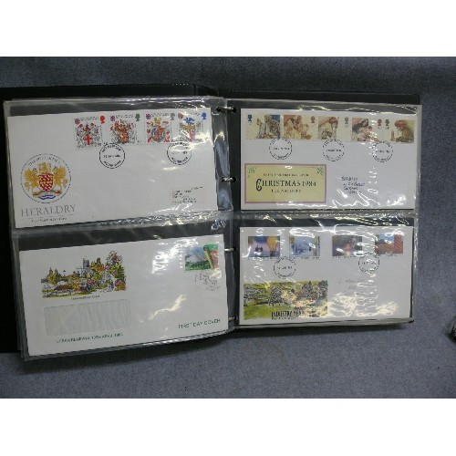 104 - AN ALBUM CONTAINING 80 DIFFERENT FIRST DAY COVERS 1965-2003