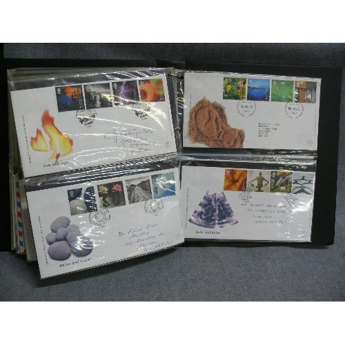 104 - AN ALBUM CONTAINING 80 DIFFERENT FIRST DAY COVERS 1965-2003