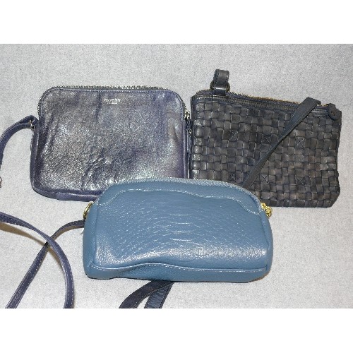 106 - THREE GOOD QUALITY BLUE LEATHER HANDBAGS INCLUDING ONE BY OSPREY