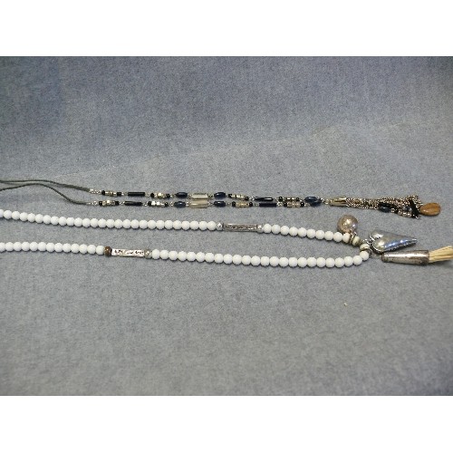 42 - ETHNIC STYLE LONG WHITE BEADED NECKLACE WITH INTERMITTENT METAL BARS WITH IMPRINTED 'FOLLOW YOUR HEA... 