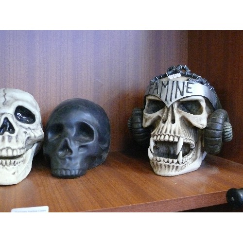 147 - FIVE VARIOUS SKULL ORNAMENTS