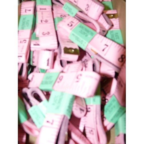 254 - A LARGE QUANTITY OF BRAND NEW PINK TAPE MEASURES 40+