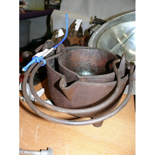 182 - FOUR CAST IRON MELTING POTS AND A LADLE