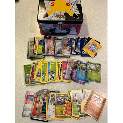 39 - Pokemon tin with approx 150 Pokemon cards