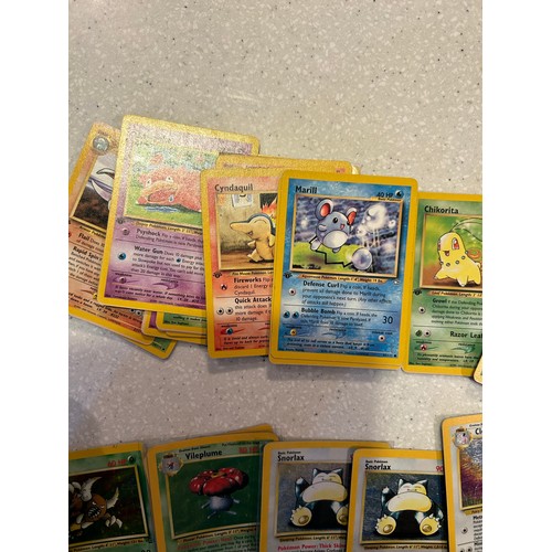 33 - Over 70 Pokemon cards - Base Fossil & Jungle including Halos