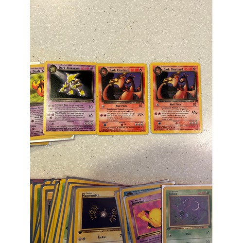 32 - Approx 60 Pokemon cards - Team Rocket - including 1st Edition & Dark Charizard