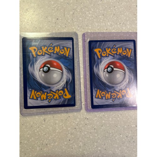 38 - 2 rare mis-cut Pokemon cards