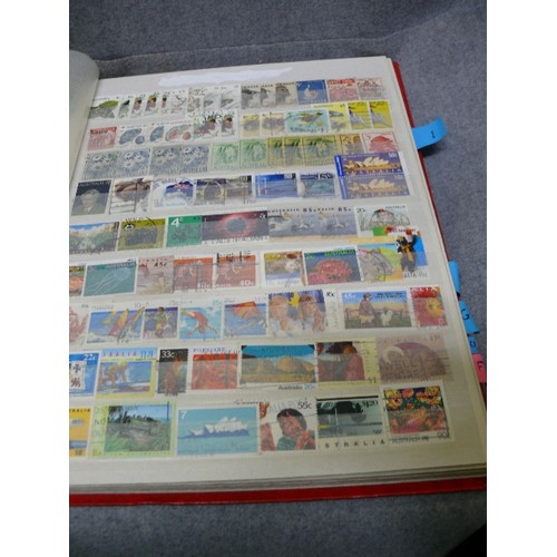 57 - 4 WELL FILLED STOCK BOOKS  OF STAMPS INCLUDING GEORGE V EARLY BRITISH, CEYLON, RHODESIA - MANY HUNDR... 