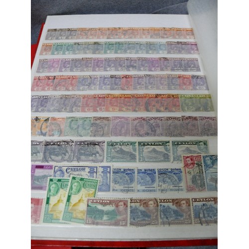 57 - 4 WELL FILLED STOCK BOOKS  OF STAMPS INCLUDING GEORGE V EARLY BRITISH, CEYLON, RHODESIA - MANY HUNDR... 