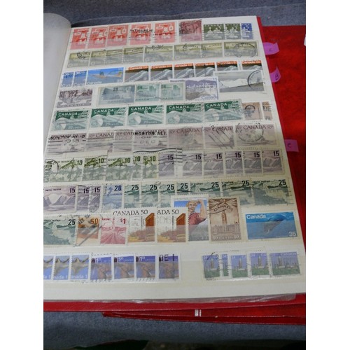 57 - 4 WELL FILLED STOCK BOOKS  OF STAMPS INCLUDING GEORGE V EARLY BRITISH, CEYLON, RHODESIA - MANY HUNDR... 