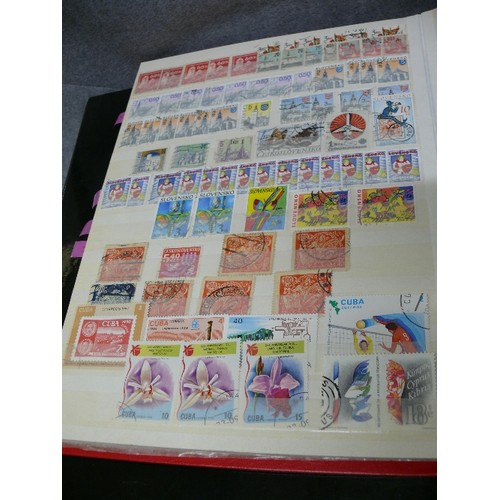 57 - 4 WELL FILLED STOCK BOOKS  OF STAMPS INCLUDING GEORGE V EARLY BRITISH, CEYLON, RHODESIA - MANY HUNDR... 