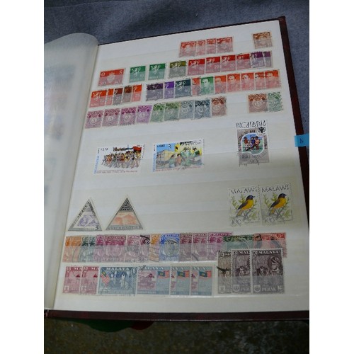 57 - 4 WELL FILLED STOCK BOOKS  OF STAMPS INCLUDING GEORGE V EARLY BRITISH, CEYLON, RHODESIA - MANY HUNDR... 