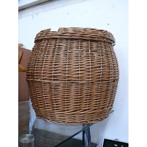 A LARGE ALI BABA WICKER BASKET