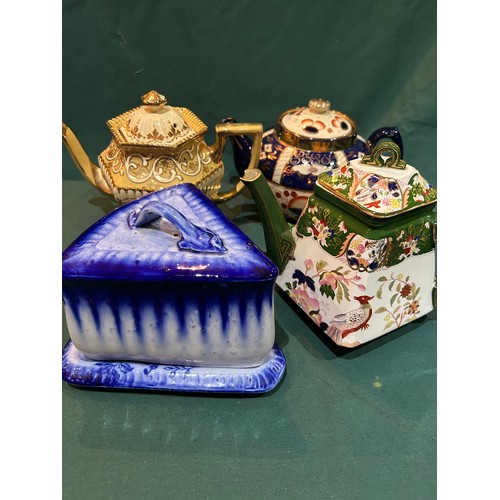 82 - 3 VICTORIAN  EDWARDIAN TEAPOTS AND A FLOW BLUE CHEESE DISH. INCLUDES A RARE MASONS ANGULAR TEAPOT, G... 