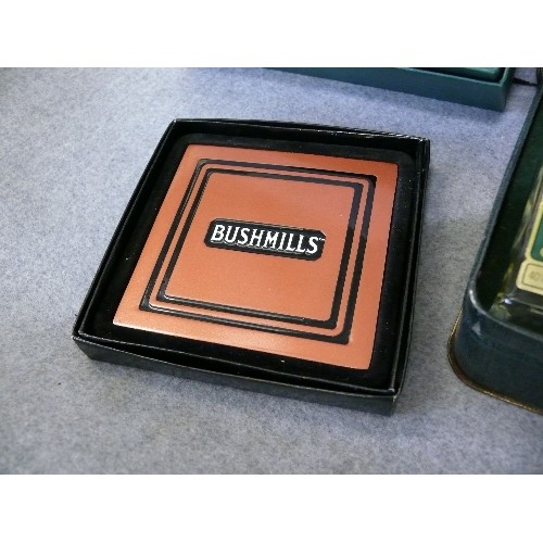 149 - A SELECTION OF BUSHMILLS WHISKY, ALL BOXED PLUS MATCHING COASTERS AND 2 GUINNESS PENS PLUS A PAIR OF... 