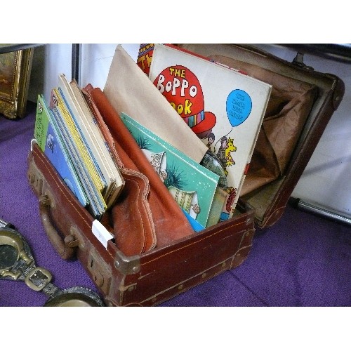 150 - A VINTAGE SUITCASE WITH CONTENTS OF VINTAGE CHILDRENS BOOKS, PLACEMATS, MATERIAL ETC.