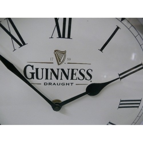 162 - A LARGE GUINNESS WALL CLOCK