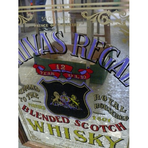 209 - A LARGE WOODEN FRAMED CHIVAS REGAL BLENDED SCOTCH WHISKY MIRROR